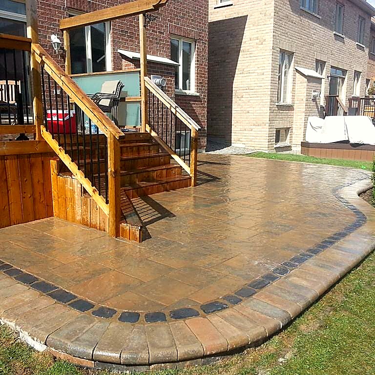 Hardscaped patio and deck completed by A New Look Construction